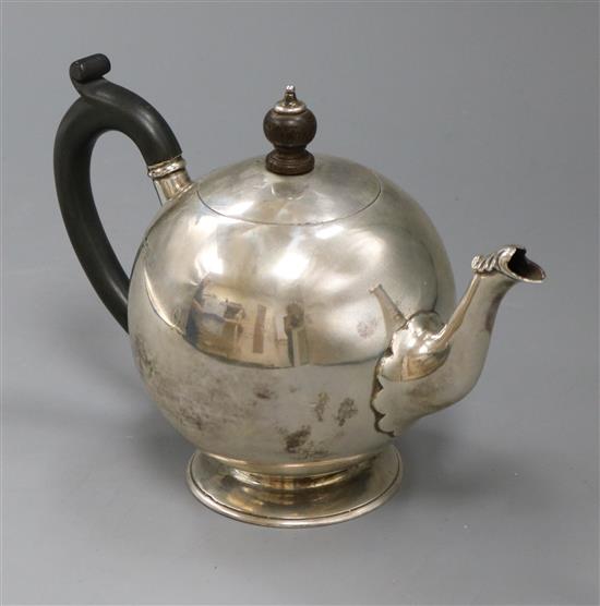 A Victorian silver bullet shaped teapot, Pairpoint Brothers, London, 1894, gross 11 oz.